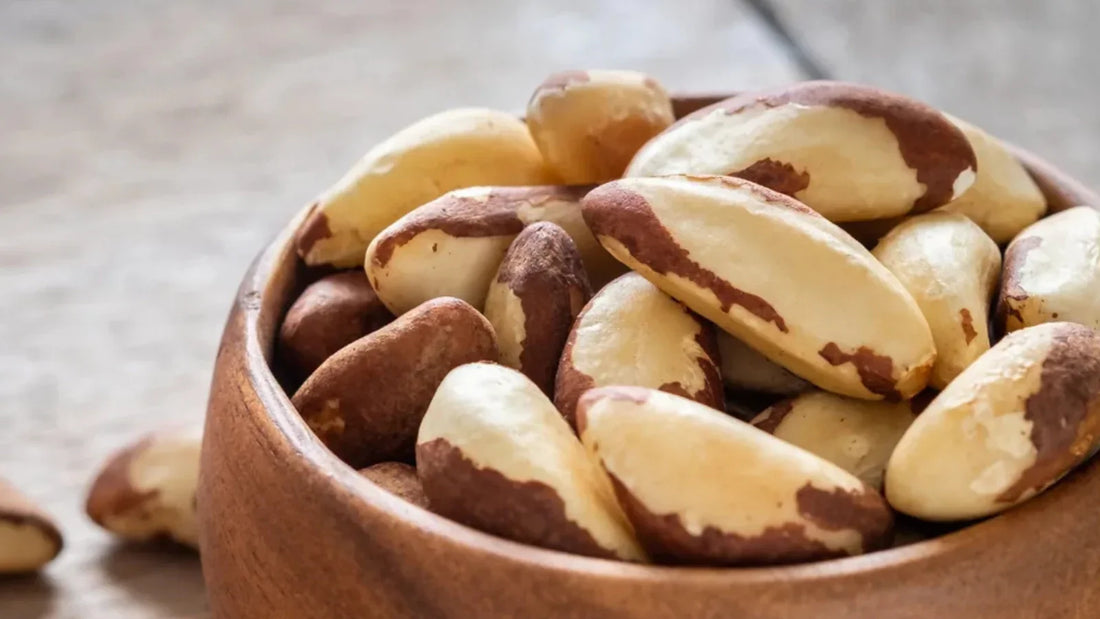 Brazil nuts in a wooden bowl. Natural food source of selenium for immune support. 