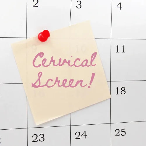Calendar image with a sticky note that reads "Cervical Screen!" pinned on  it. The alt text editor is open on a computer screen with a blog post about HPV in the background.