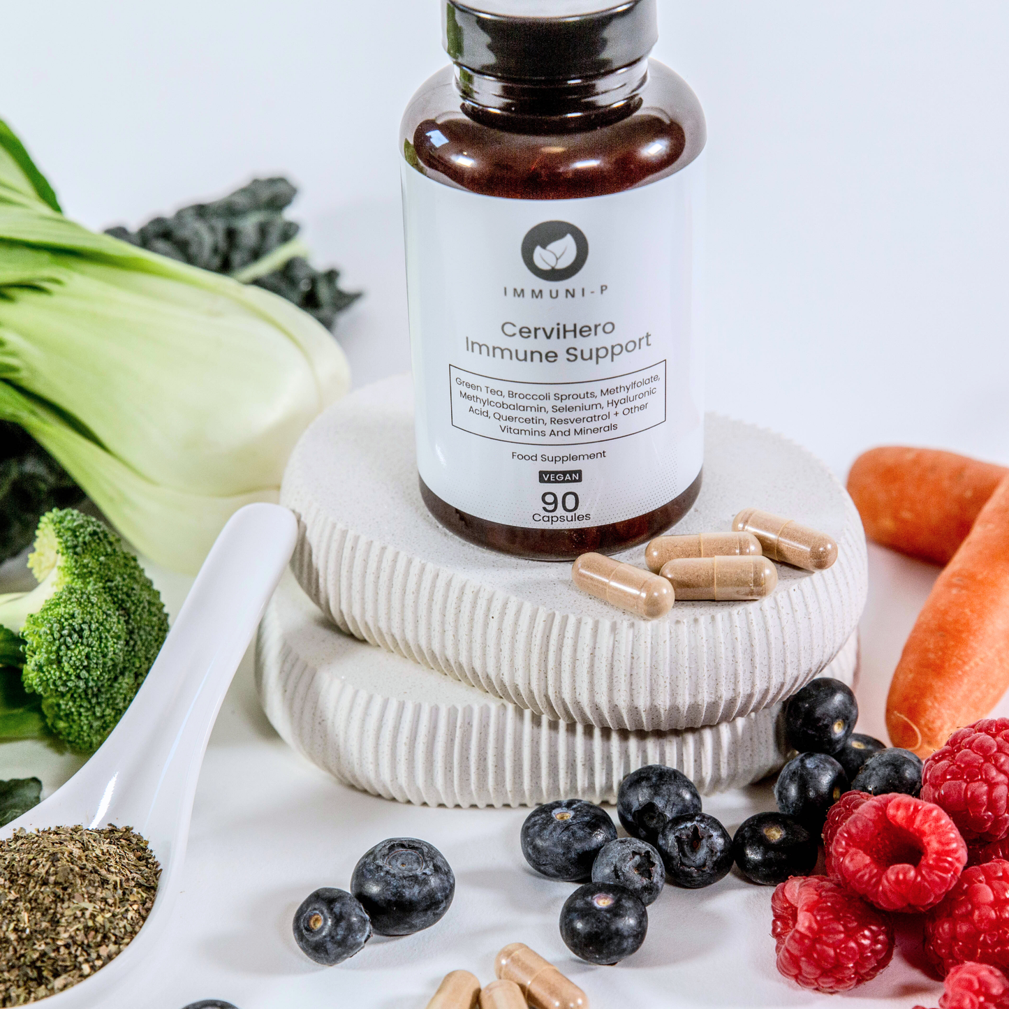 Supplement bottle labeled 'CerviHero Immune Support' surrounded by vegetables and fruits on a white surface.