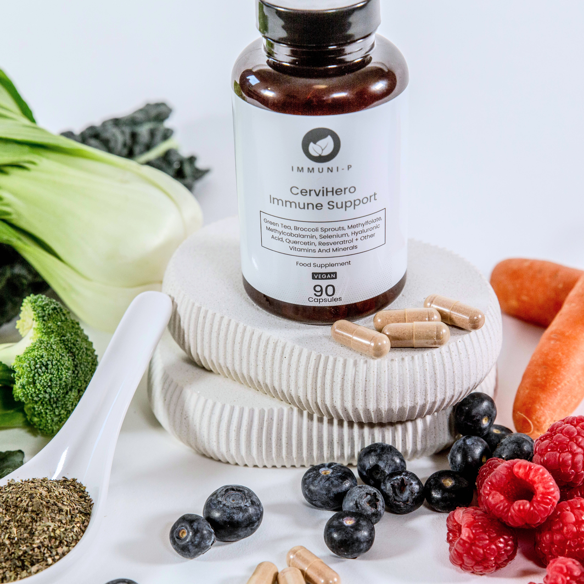 Supplement bottle labeled 'CerviHero Immune Support' surrounded by vegetables and fruits on a white surface.