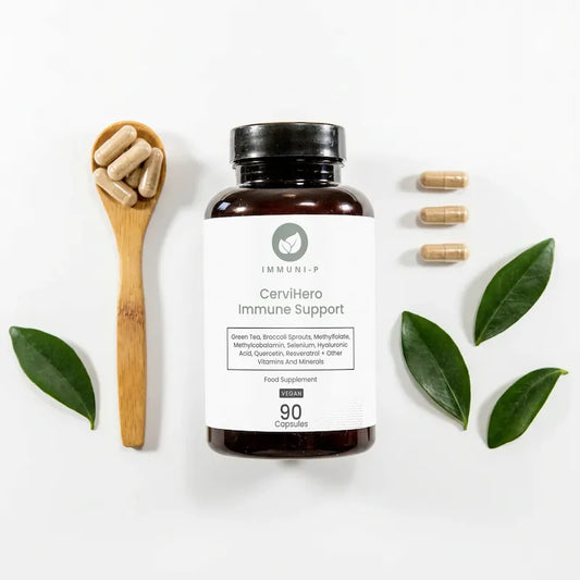 CerviHero Immune Support dietary supplement bottle in flat lay with visible capsules arranged on a neutral background